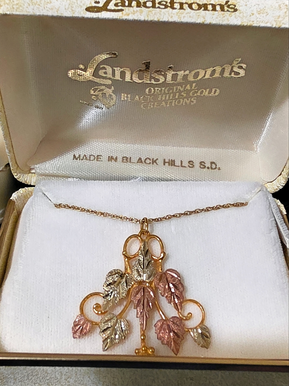 New old stock in original box. Vintage Black Hills Gold 10kt Large Grape Leaf &